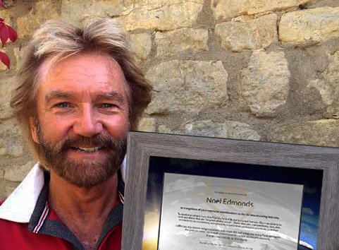 Award to Noel Edmonds.